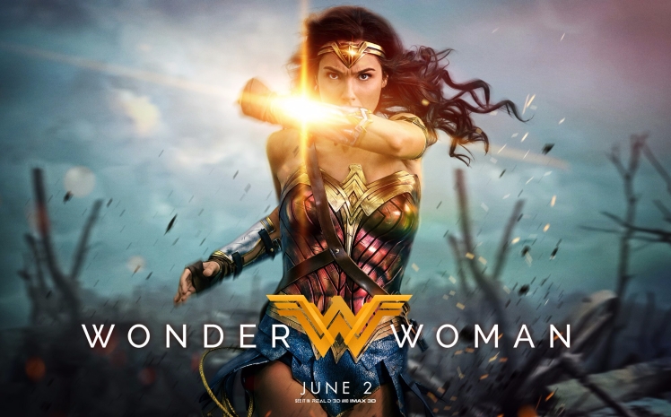 wonder woman 2017 film poster which wonder woman running and holding arm up to shield bullets flying towards her